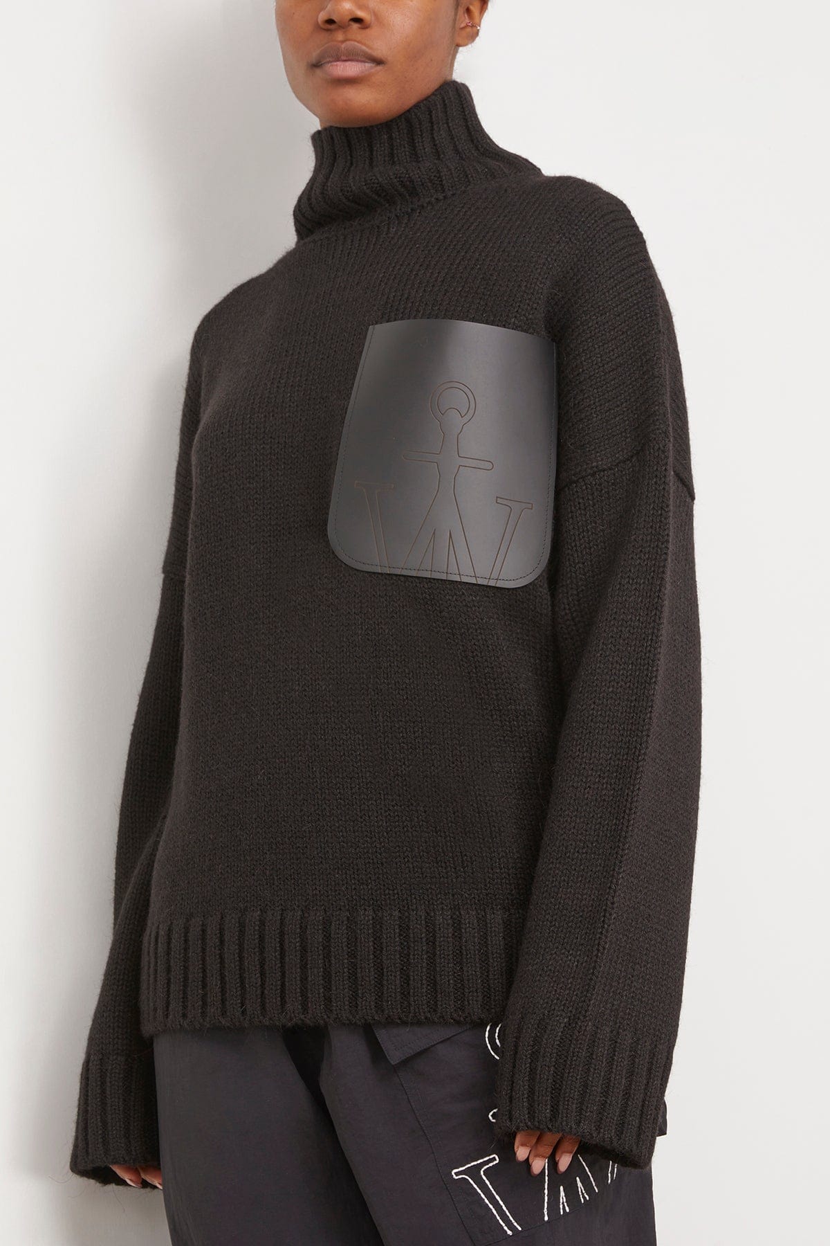 JW Anderson Sweaters Leather Patch Pocket Jumper in Black JW Anderson Leather Patch Pocket Jumper in Black