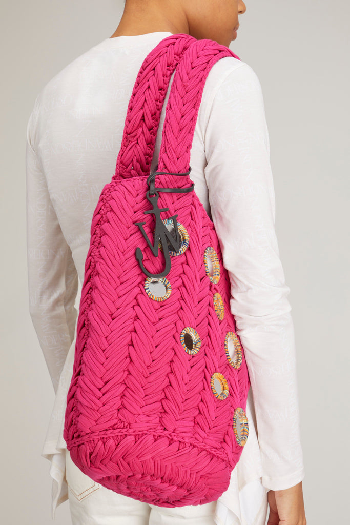 http://hampdenclothing.com/cdn/shop/products/jw-anderson-knitted-shopper-bag-in-hot-pink_1024x1024.jpg?v=1658436965