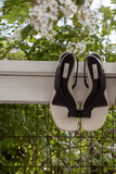 Toteme Strappy Heels Leather Heeled Thong Sandals in Black/Sand Toteme Leather Heeled Thong Sandals in Black/Sand