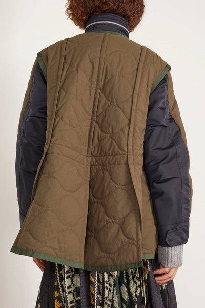 Sacai Coats Rip Stop Quilted Coat in Khaki/Dark Navy Sacai Rip Stop Quilted Coat in Khaki/Dark Navy