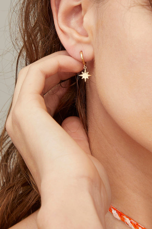 Theodosia Earrings Starburst Drop Huggies in 14k Yellow Gold