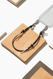 Ossa Shoulder Straps Leather Bolo Wristlet in Black Ossa Leather Bolo Wristlet in Black