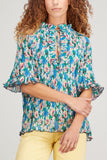 Ganni Tops Pleated Georgette Ruffle V-Neck Blouse in Floral Azure Blue Ganni Pleated Georgette Ruffle V-Neck Blouse in Floral Azure Blue
