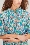 Ganni Tops Pleated Georgette Ruffle V-Neck Blouse in Floral Azure Blue Ganni Pleated Georgette Ruffle V-Neck Blouse in Floral Azure Blue