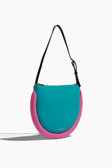 JW Anderson Shoulder Bags The Bumper Moon Shoulder Bag in Turquoise/Bubblegum Pink JW Anderson The Bumper Moon Shoulder Bag in Turquoise/Bubblegum Pink